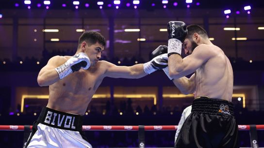 Dmitry Bivol's (L) jab was a key in his win over Artur Beterbiev Saturday.