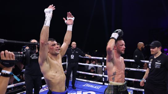Jack Catterall (L) celebrates his 117-111, 117-111 and 116-113 victory Saturday over Josh Taylor in Leeds, England.