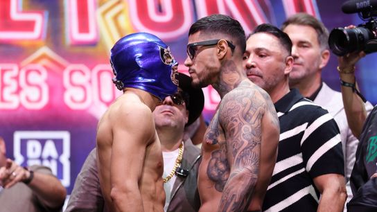 Teofimo Lopez (L) and Arnold Barboza square off at Thursday's weigh-in.