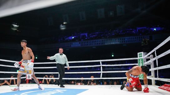 Junto Nakatani heads to a neautral corner as Vincent Astrolabio struggles on the canvas after Nakatani caught him with a left to the body. Junto Nakatani heads to a neautral corner as Vincent Astrolabio struggles on the canvas after Nakatani caught him with a left to the body.