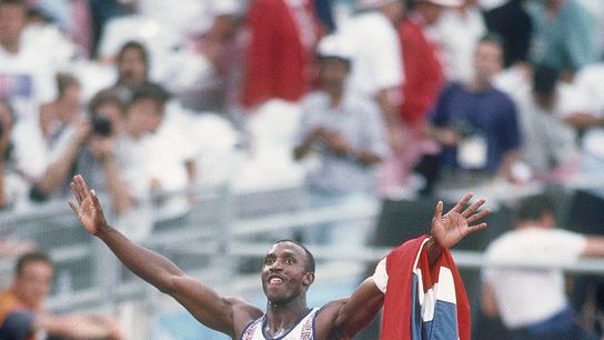 Linford Christie celebrates after becoming at 32 the oldest man to win an Olympic gold medal in the 100 meters. He did it at the 1992 Olympics in Barcelona, Spain.