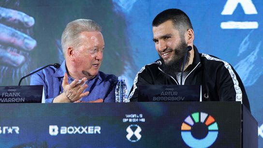 Promoter Frank Warren (L) chats with unified light heavyweight champion Artur Beterbiev.