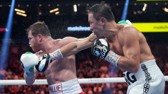 Former boxing middleweight champion Gennadiy Golovkin (R), shown landing a right cross on Canelo Alvarez in their 2022 bout in Las Vegas, managed to become a star in the U.S. despite being from Kazakhstan, where Shavkat Rakhmonov is from.