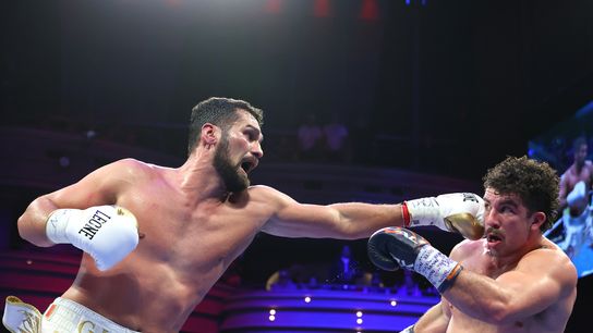Guido Vianello (L) jabs at Richard Torrez (R). Torrez won by unanimous decision.