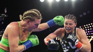 Bizarre build-up culminates in brilliant brawl, as Mikaela Mayer claims WBO welterweight title by edging Sandy Ryan (boxing). Photo by Mikey Williams/Top Rank