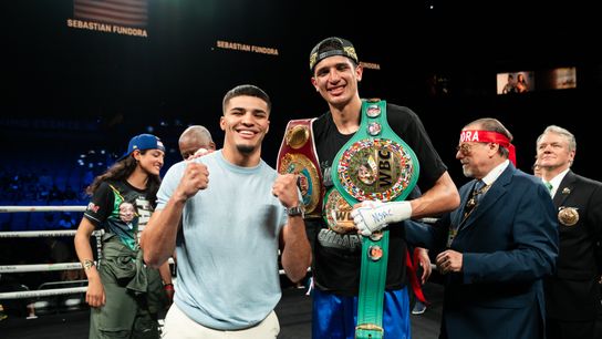 Unbeaten Xander Zayas (L) poses with WBC-WBO super welterweight champion Sebastian Fundora after Fundora's TKO of Chordale Booker Saturday in Las Vegas.