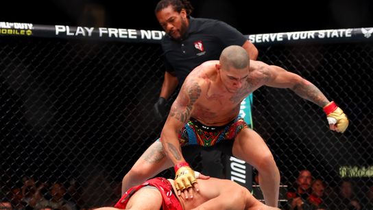 Light heavyweight champion Alex Pereira puts the finishing touches on Jiri Prochazka Saturday.