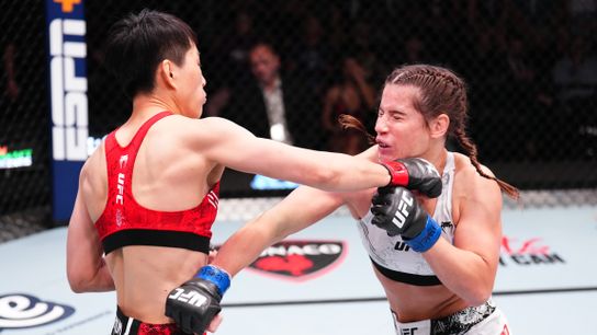Wang Cong (L) lands a right on Victoria Leonardo's chin in Saturday's opener at UFC Apex, finishing the fight in just 1:02. Wang Cong (L) lands a right on Victoria Leonardo's chin in Saturday's opener at UFC Apex, finishing the fight in just 1:02.