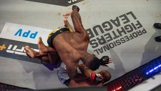 Francis Ngannou (top) finishes off Renan Ferreira at 3:32 of the first round Saturday.