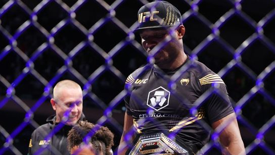 Kamaru Usman leaves the Octagon after defeating Colby Covington at UFC 268 in 2021.