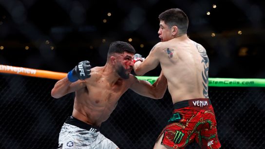 Brandon Moreno (R) follows through on a left during a unanimous decision win over Amir Albazi at Rogers Place in Edmonton. Scores were 50-45 twice and 49-46.