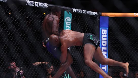 Kamaru Usman takes Joaquin Buckley down in their welterweight fight on Saturday in Atlanta.
