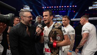 Usman Nurmagomedov keeps Bellator lightweight title in thriller with Paul Hughes (mma). Photo by Courtesy PFL