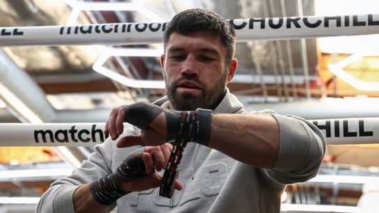 John Ryder wraps his hands as he prepares to face Jaime Munguia on Saturday in Phoenix.