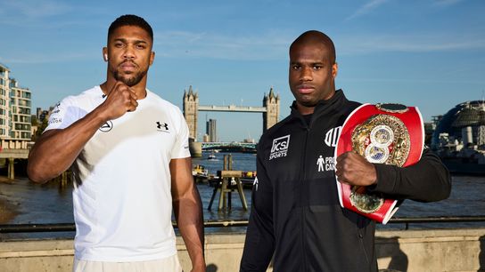 Challenger Anthony Joshua (L) and champion Daniel Dubois pose ahead of their IBF heavyweight title fight Saturday at Wembley Stadium in London.
