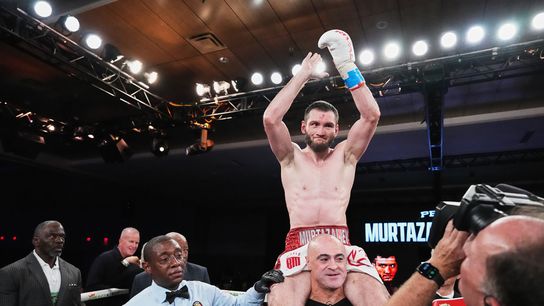 Bakhram Murtazaliev celebrates his third-round TKO victory Saturday over Tim Tszyu.